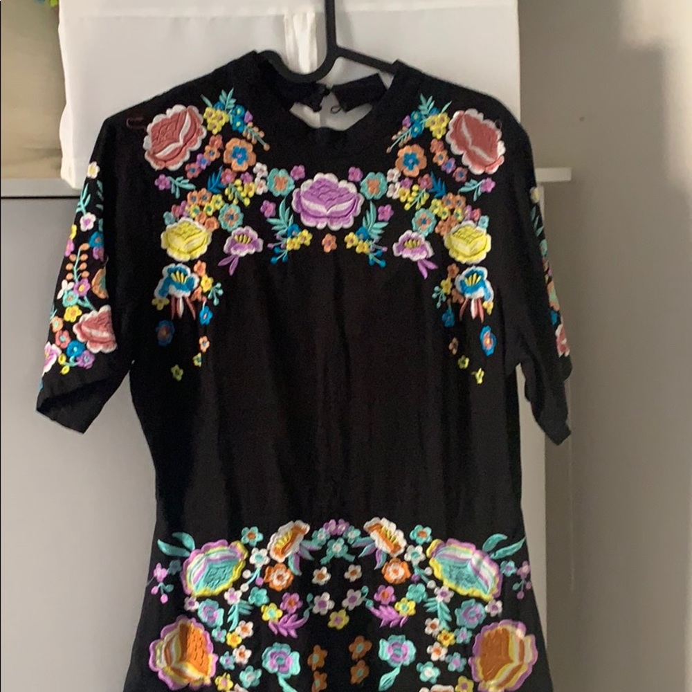 Black skater dress with floral embroidery